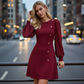 Elegante jurk met lange mouwen en asymmetrisch knoopdetail