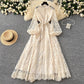 Vintage geborduurde jurk met lantaarnmouwen