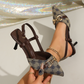 Dames pointy-toe slingback hakken met metalen ketting