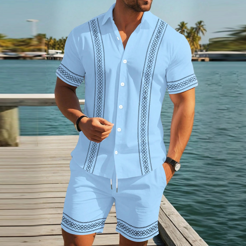 Herenset bestaande uit een shirt met korte mouwen en een short met bloemenprint.