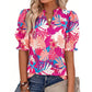 Dames zomerse top met bloemenprint en pofmouwen