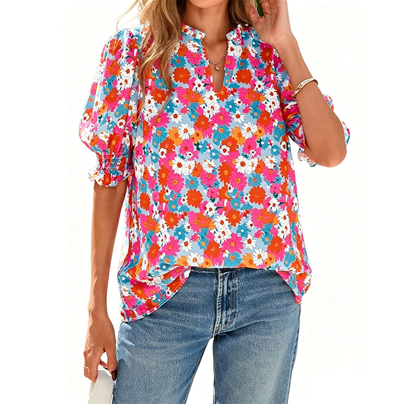 Dames zomerse top met bloemenprint en pofmouwen
