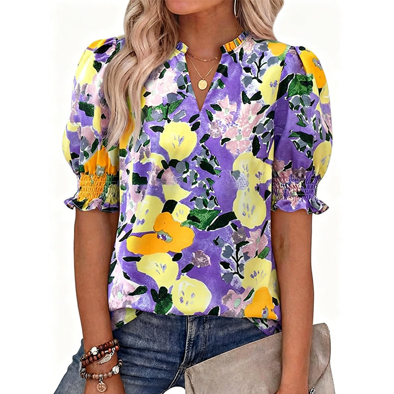 Dames zomerse top met bloemenprint en pofmouwen