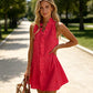 Dames minijurk met ruches en knoopsluiting