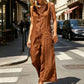 Mouwloze damesjumpsuit met V-hals en knoopsluiting aan de voorkant