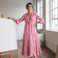 Dames maxi-jurk met ruches, V-hals en gelaagde rok