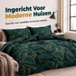 Beddengoedset met tropische palmbladeren